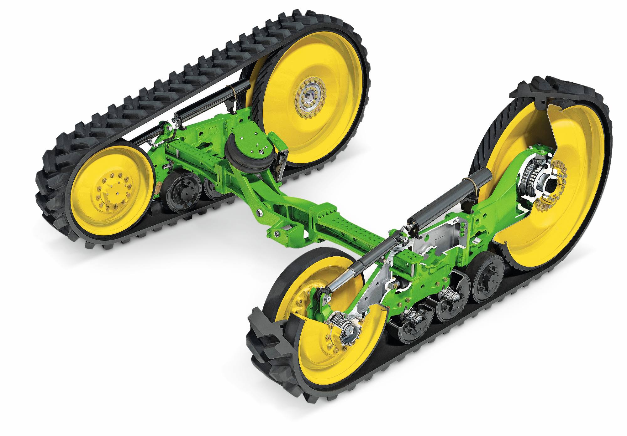 Комплекти вериги на трактори John Deere с гумени вериги, рамена на окачването и жълти задвижващи колела, показани на бял фон в студио.